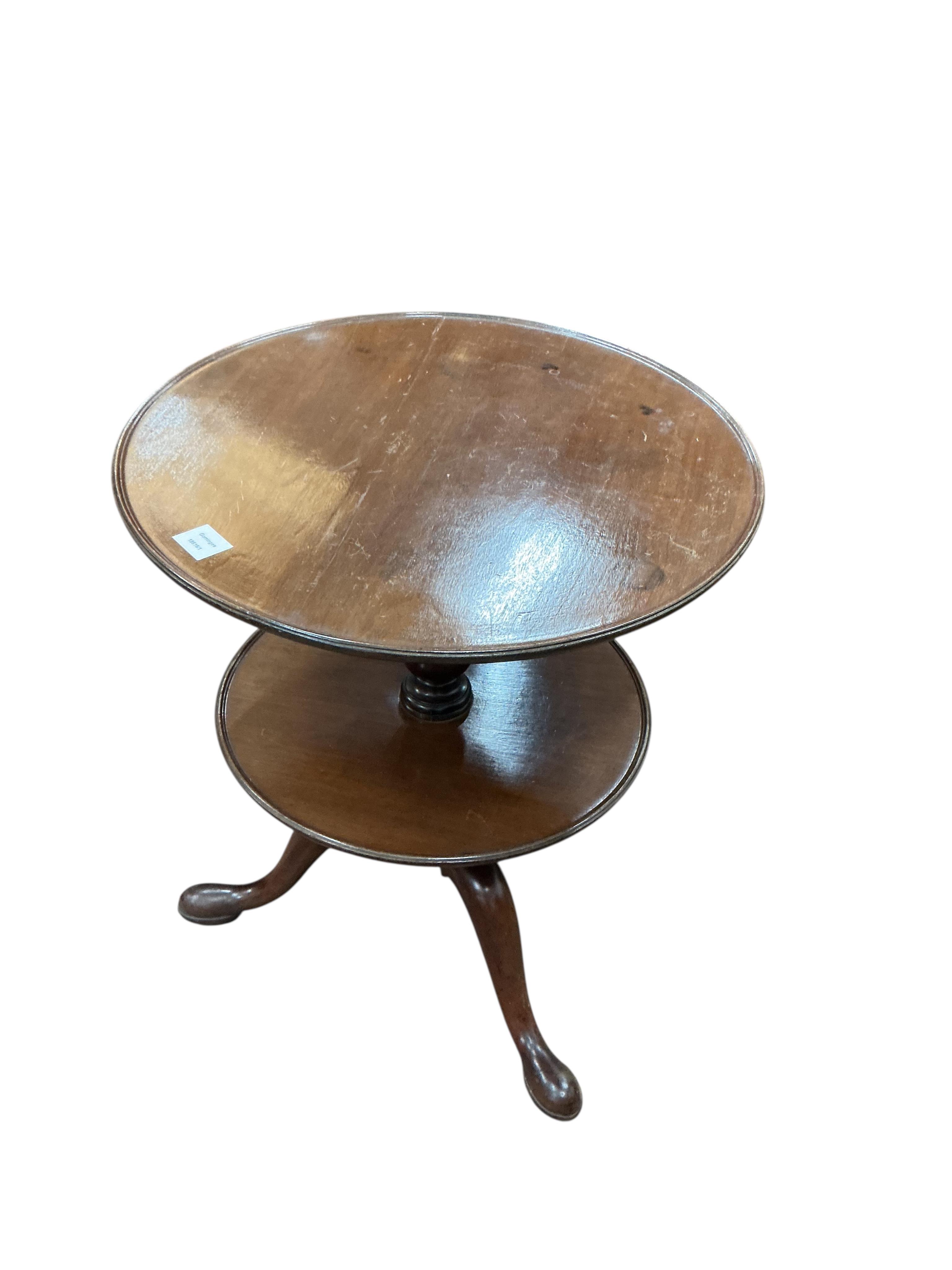 A George III and later circular mahogany two tier revolving dumb waiter, adapted, diameter 60cm, height 72cm